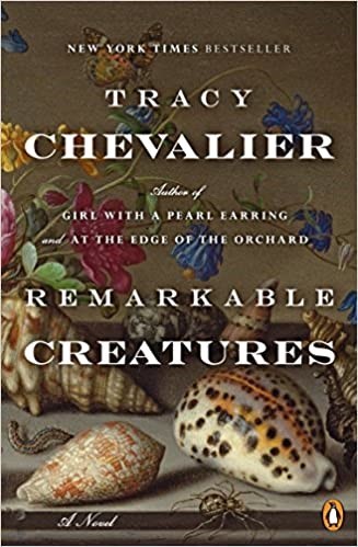 Book cover of "Remarkable Creatures" by Tracy Chevalier. Features a still life on a table – flowers, seashells, and insects.