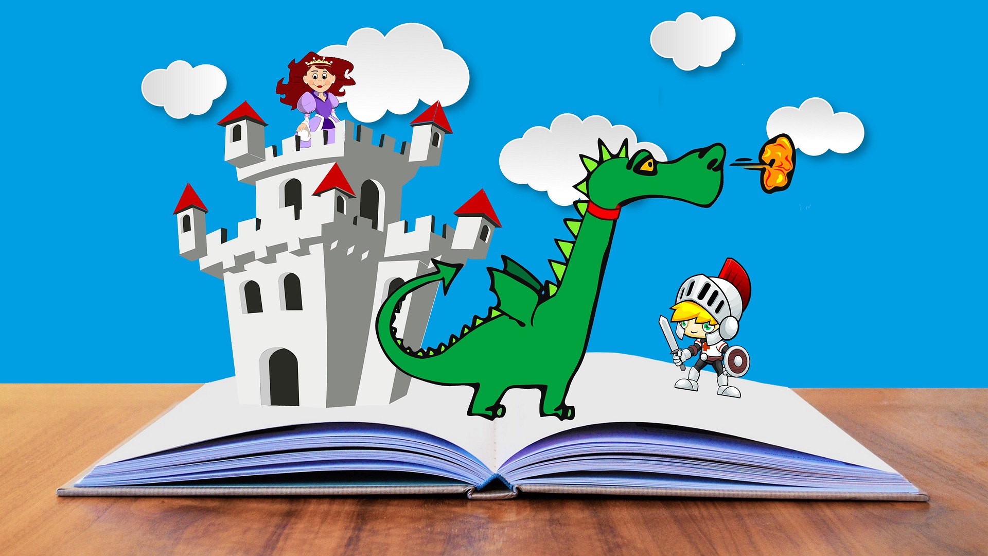 Book laying on table open to the middle. A princess in a castle, a dragon breathing fire, and a knight are all standing on top of the book pages.