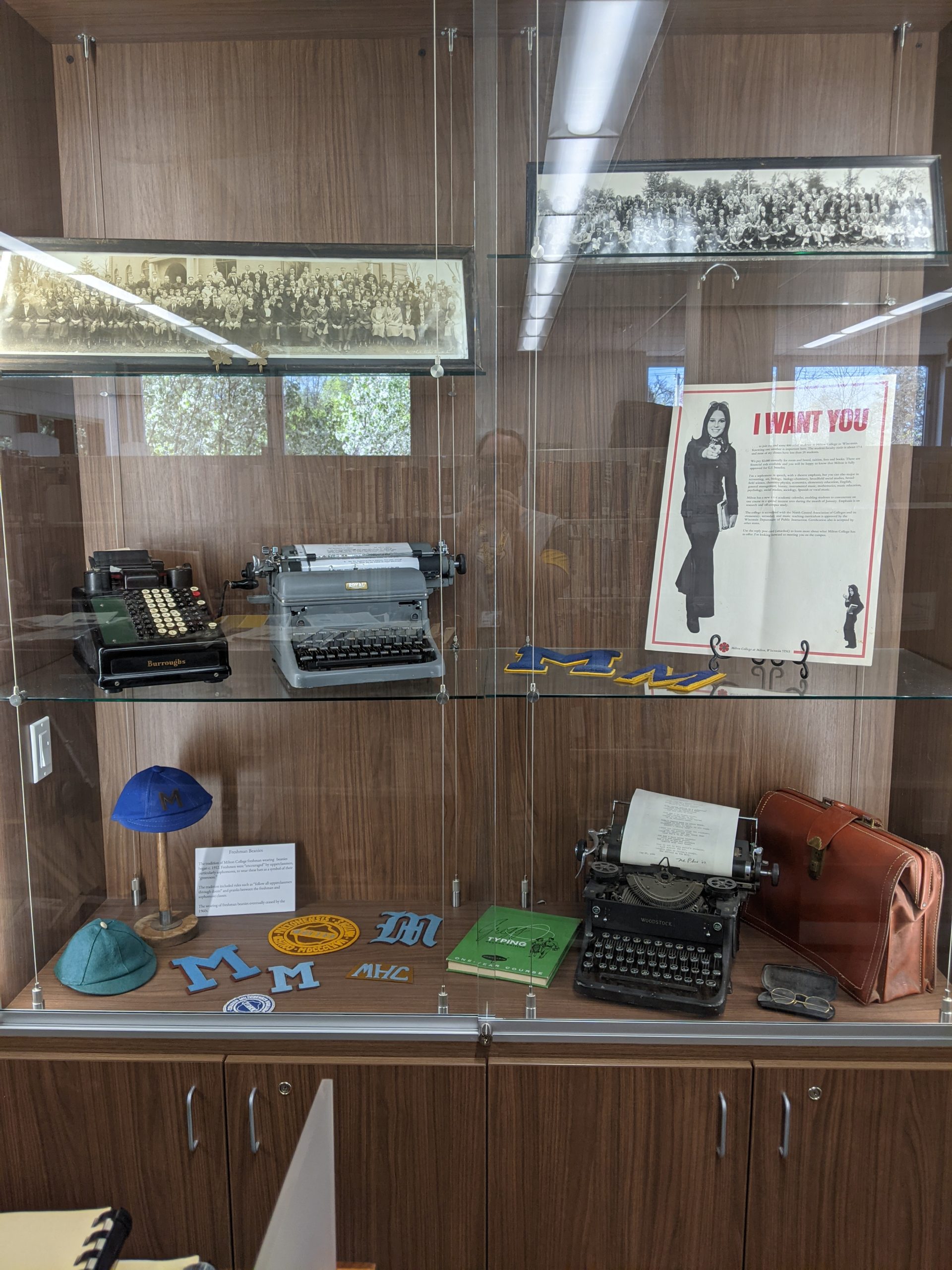 Display case with Milton College Paraphanalia