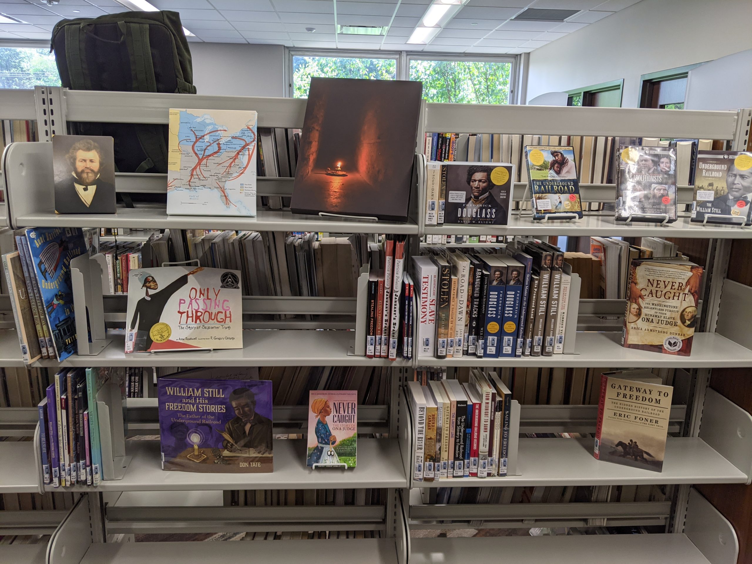 Display case with Milton College Paraphanalia