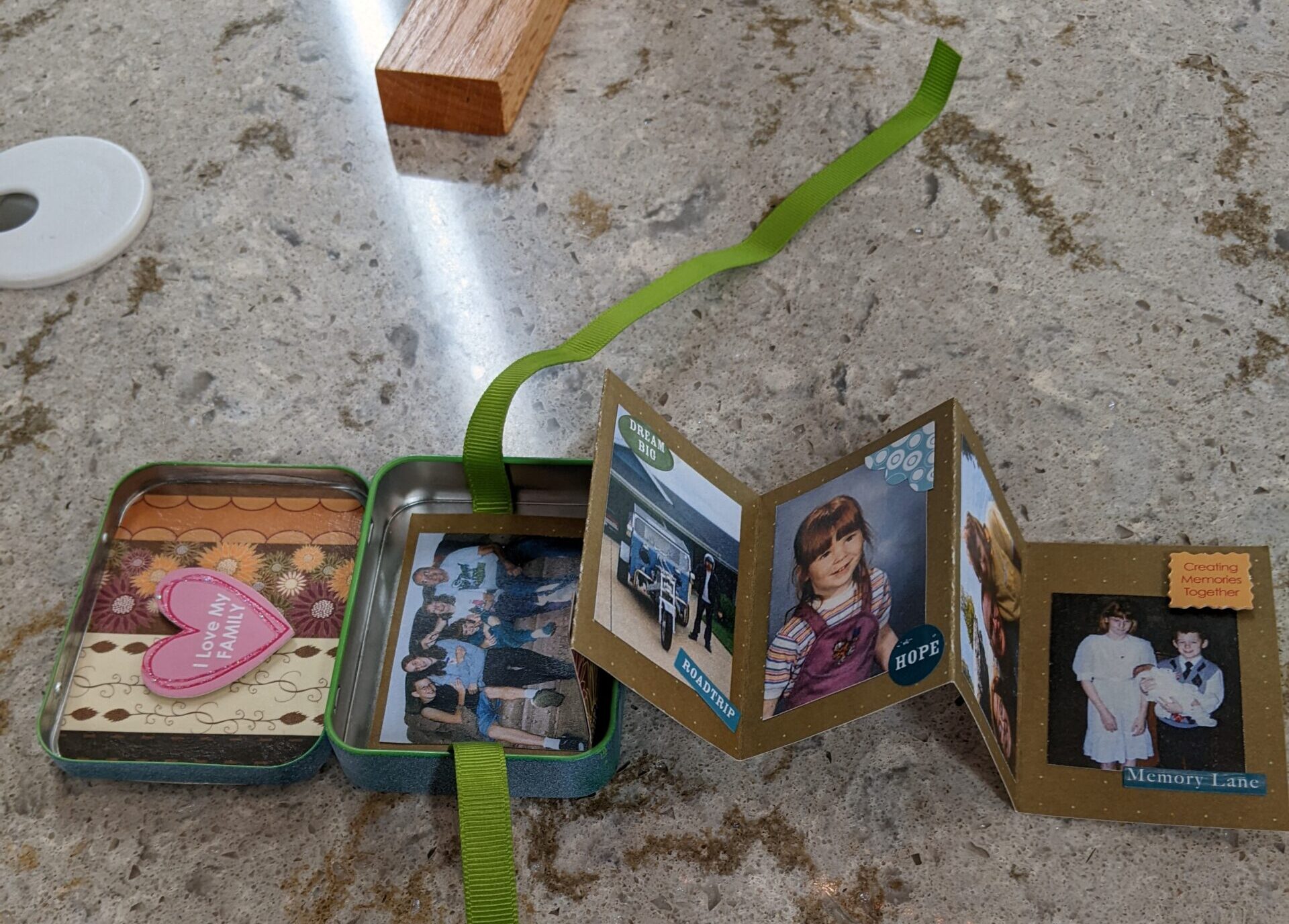 Mini mint tin crafted into a mini photo album