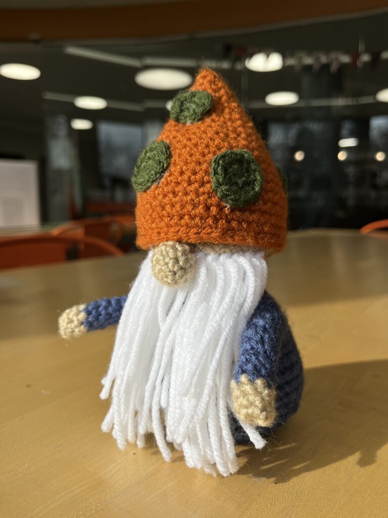 Crocheted garden gnome.