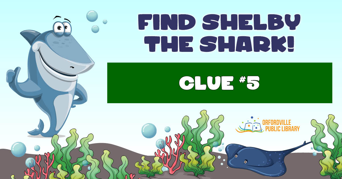 Illustrated underwater scene featuring a shark, colorful seaweed, and a stingray. Words read: Find Shelby the Shark. Clue #5.